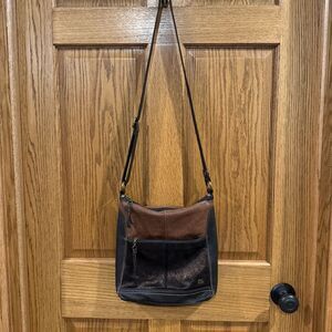 The Sak Brown Copper Leather Crossbody Bag. BRN1563A